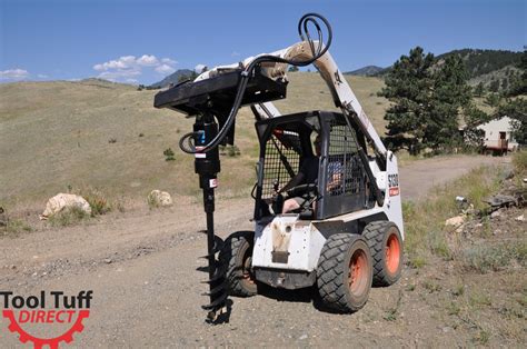 skid steer digging pictures|skid steer post hole attachment.